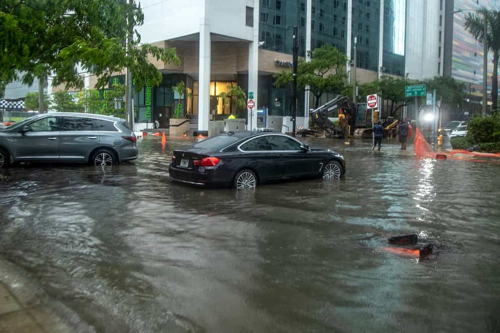 Rain from Tropical Storm Alex floods the Brickell area near central Miami (Pedro Portal/Miami Herald/AP)