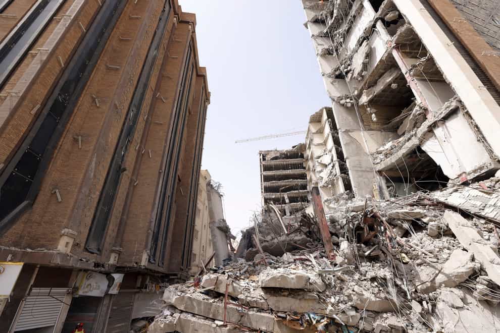 The remains of a 10-storey building under construction which collapsed in the south-western Iraqi city of Abadan (Iranian Senior Vice-President Office/AP)