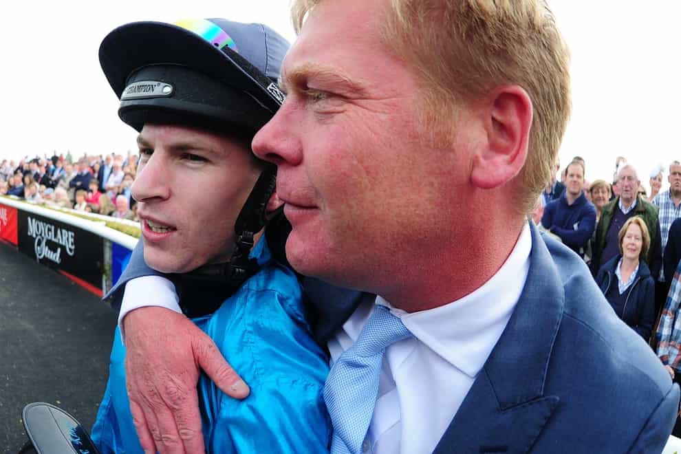 Tom Dascombe and Richard Kingscote after Brown Panther’s victory in the 2014 Irish St Leger (PA)