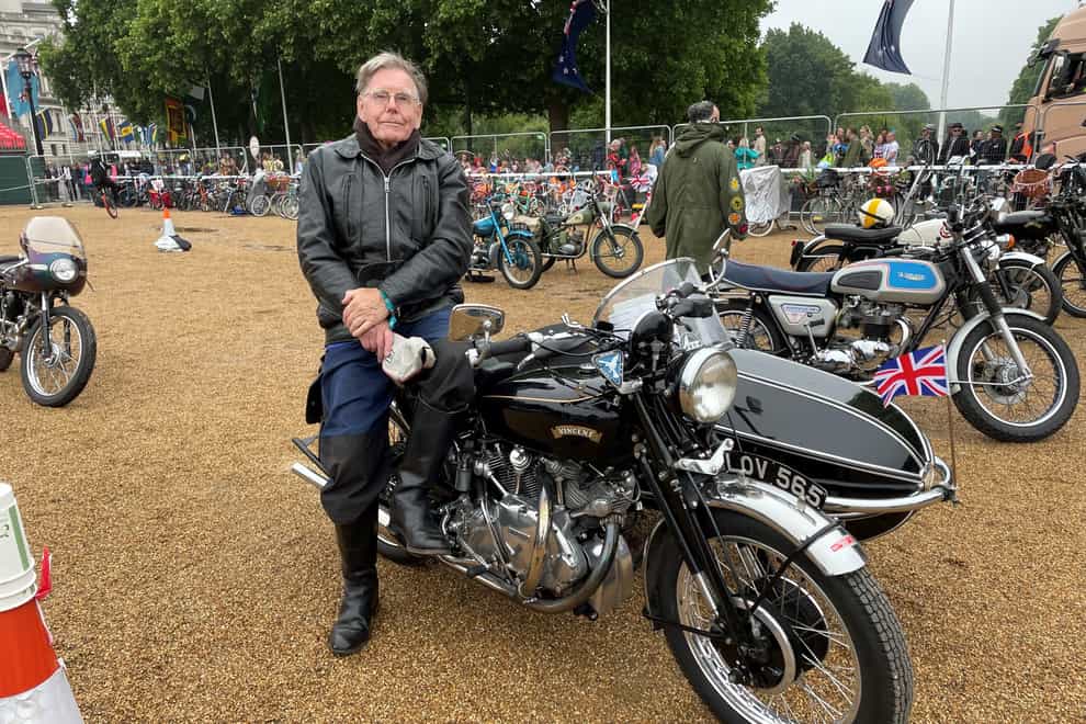 Peter Biles, 86, from High Barnet, is riding his vintage motorcycle as part of a fleet of 1950s vehicles in the Platinum Jubilee Pageant in London (Sophie Wingate/PA)