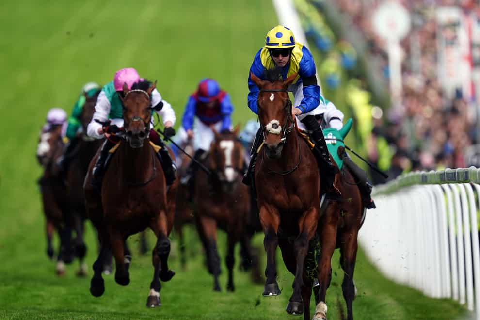 Desert Crown ridden by jockey Richard Kingscote on their way to winning the Cazoo Derby (In Memory of Lester Piggott) on Derby Day during the Cazoo Derby Festival 2022 at Epsom Racecourse, Surrey. Picture date: Saturday June 4, 2022.