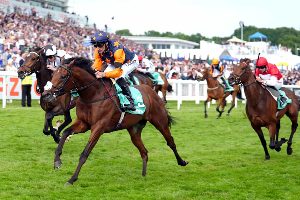 Ever Given, here ridden by jockey Daniel Tudhope to win the Poundland Surrey Stakes race on Ladies Day during the Cazoo Derby Festival, has been set the challenge of winning a Group Three next by trainer Hugo Palmer (John Walton/PA)