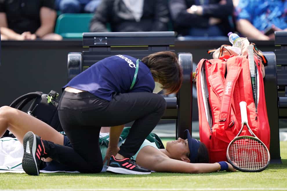 Emma Raducanu receives treatment for a side injury before having to retire in the first set of her Nottingham Open match against Viktorija Golubic (Tim Goode/PA Images).