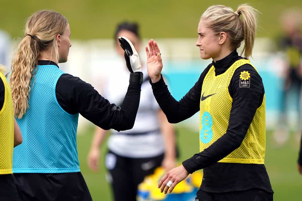Steph Houghton, right, is stepping up her training with England Women at St George’s Park (Joe Giddens/PA)