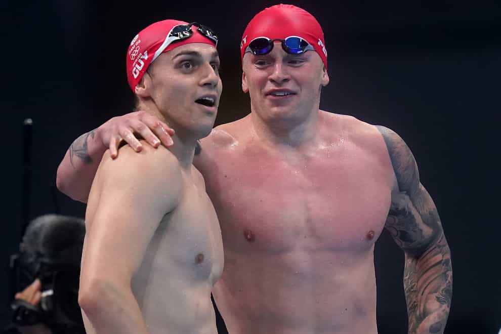 James Guy (left) will travel to Budapest without long-term team-mate Adam Peaty (Adam Davy/PA)
