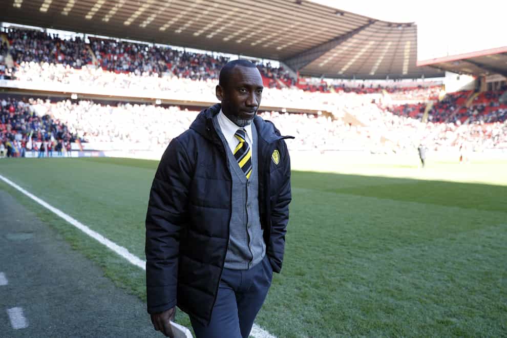Jimmy Floyd Hasselbaink has confirmed he will remain as Burton manager (Steven Paston/PA)