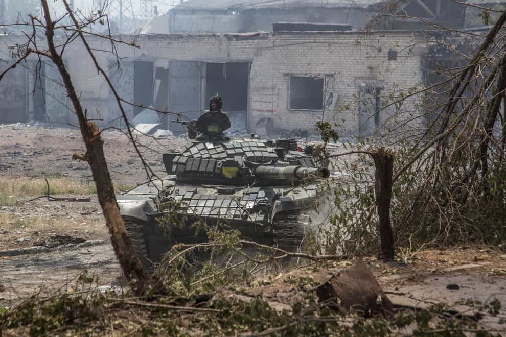 A Ukrainian tank is in position during heavy fighting on the front line in Severodonetsk, the Luhansk region, Ukraine (Oleksandr Ratushniak/AP)