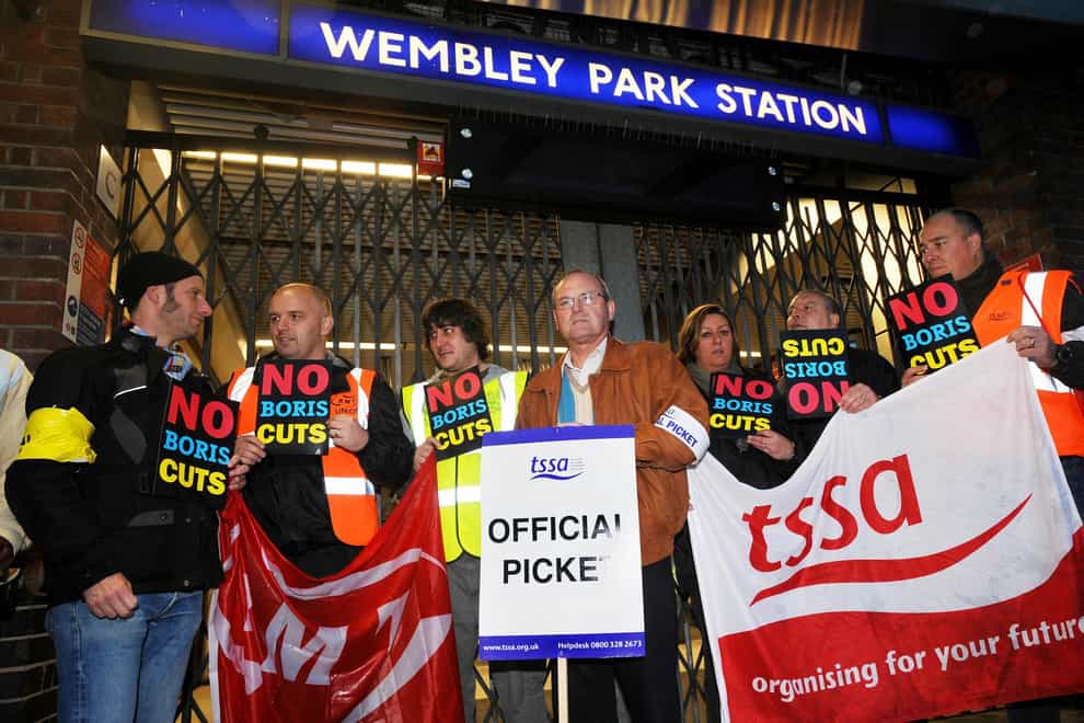 General Secretary of the TSSA union, Gerry Docherty (centre) outside Wembley Park Station, as commuters faced a struggle to get to work today as the latest Tube strike hit the capital.