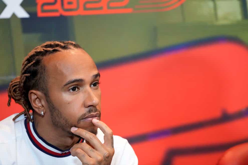 Lewis Hamilton of Britain attends a news conference at the Baku circuit, in Baku, Azerbaijan, Friday, June 10, 2022. The Formula One Grand Prix will be held on Sunday. (AP Photo/Sergei Grits)