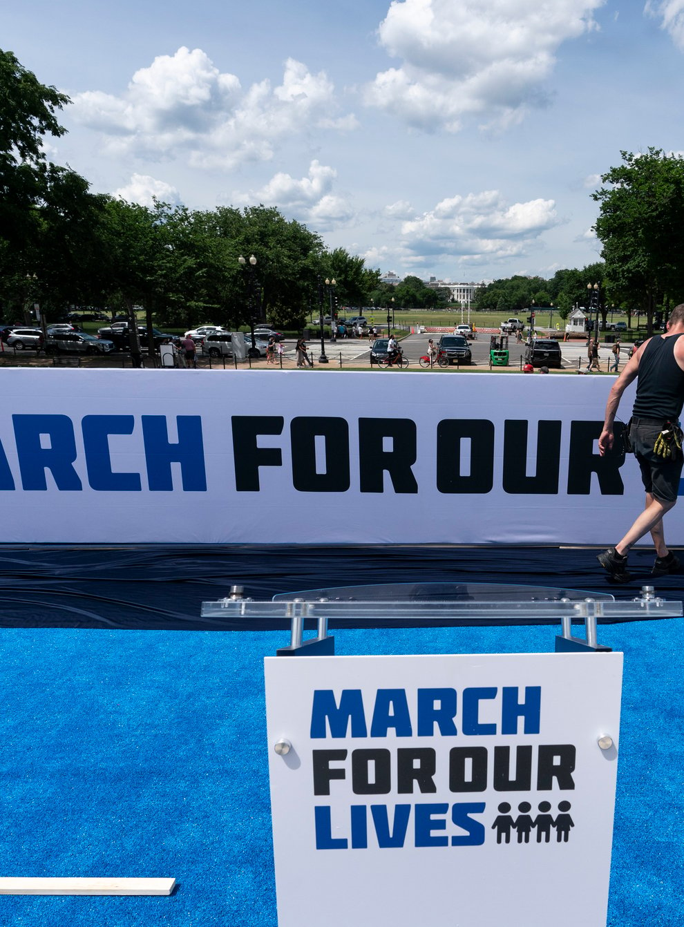 Workers set up for the March For Our Lives rally on the National Mall, near the White House (Alex Brandon/AP)