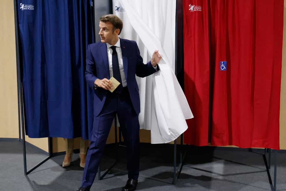 French president Emmanuel Macron’s candidates are projected to win in a greater number of districts than their leftist rivals (Ludovic Marin, Pool via AP)