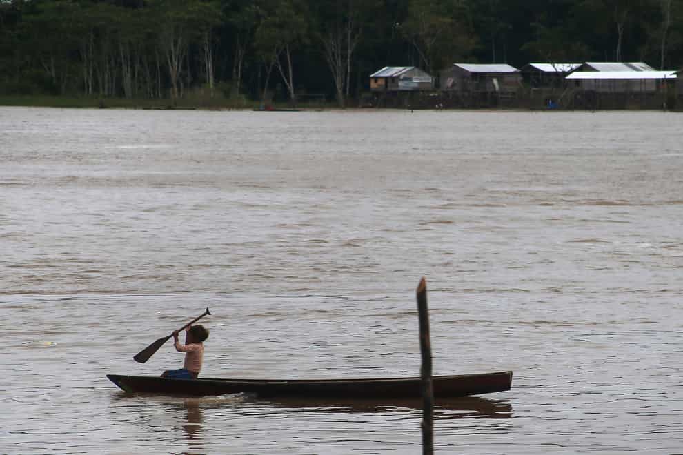 Brazil firefighters say divers have found a backpack and laptop in a remote part of the Amazon where British journalist Dom Phillips and Indigenous expert Bruno Pereira went missing a week ago (Edmar Barros/AP)