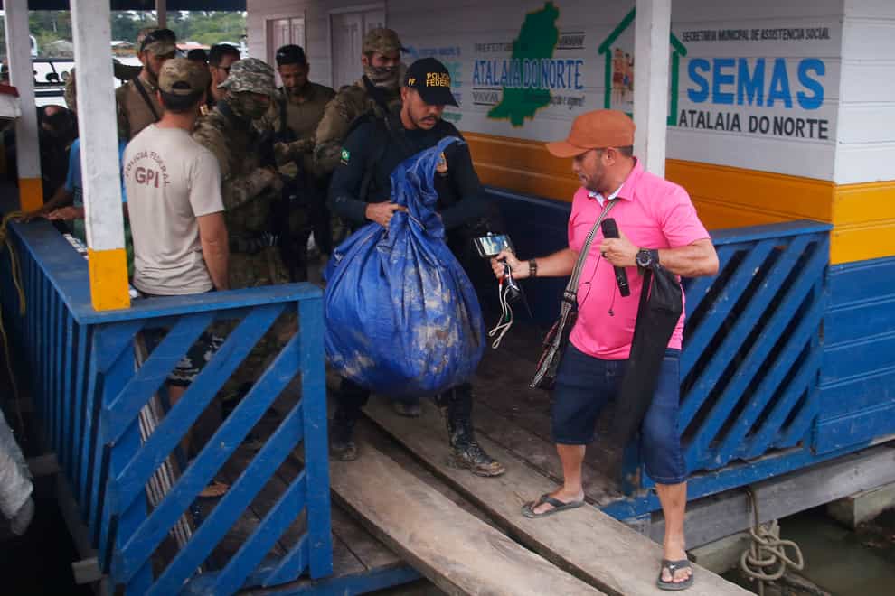 Brazil’s search for British journalist Dom Phillips and an Indigenous expert who disappeared in the Amazon a week ago has advanced with the discovery of a backpack, laptop and other personal belongings of the men submerged in a river (Edmar Barros/AP)