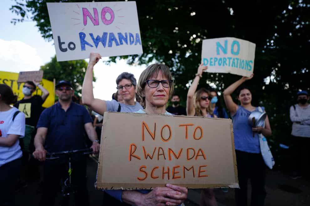 Demonstrators at a removal centre at Gatwick protest against plans to send migrants to Rwanda (Victoria Jones/PA)