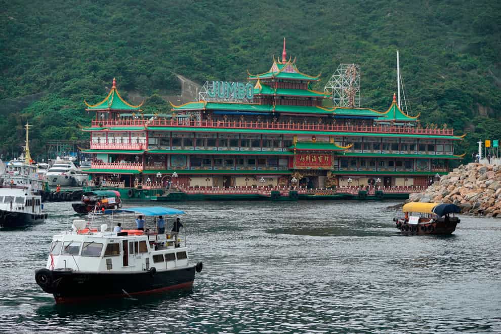 Hong Kong’s iconic Jumbo floating restaurant is towed away (Kin Cheung/AP)
