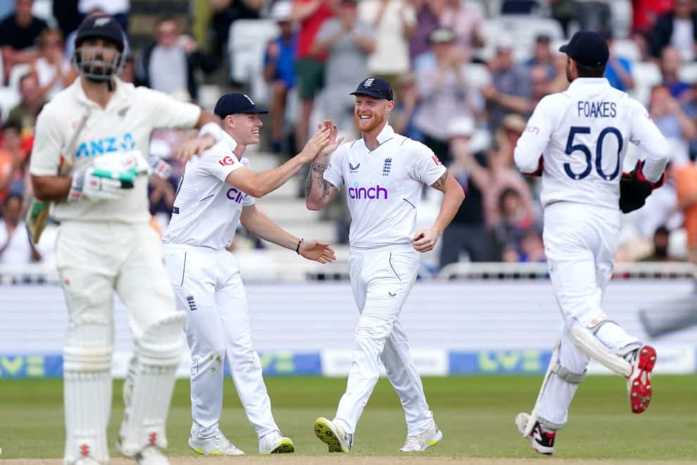 England captain Ben Stokes (centre) celebrates with team-mates after the dismissal of New Zealand No11 Trent Boult (Mike Egerton/PA Images).