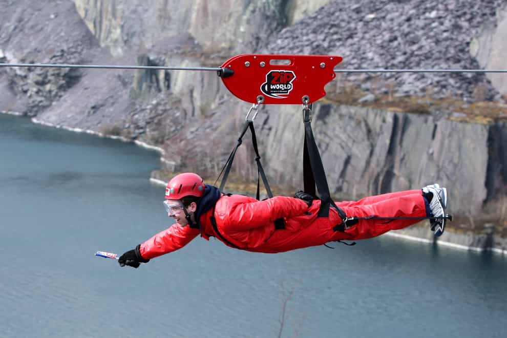 A man (name not given) goes down the zip wire at Zip World in Penrhyn Quarry, Bethesda, Bangor, North Wales.