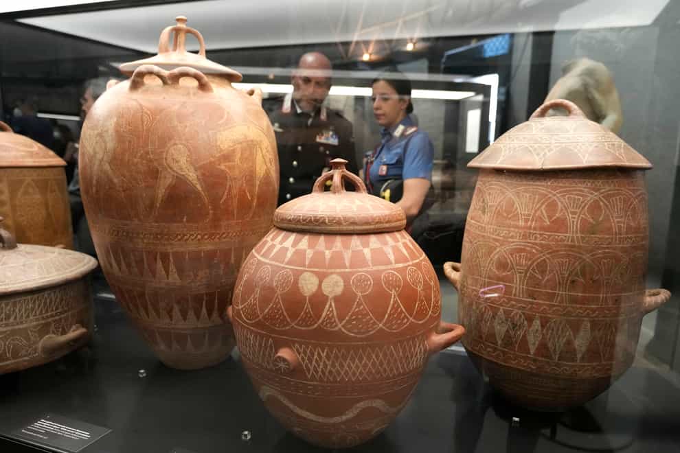 Etruscan jars displayed in the new Museum of Rescued Art in Rome (Alessandra Tarantino/AP)