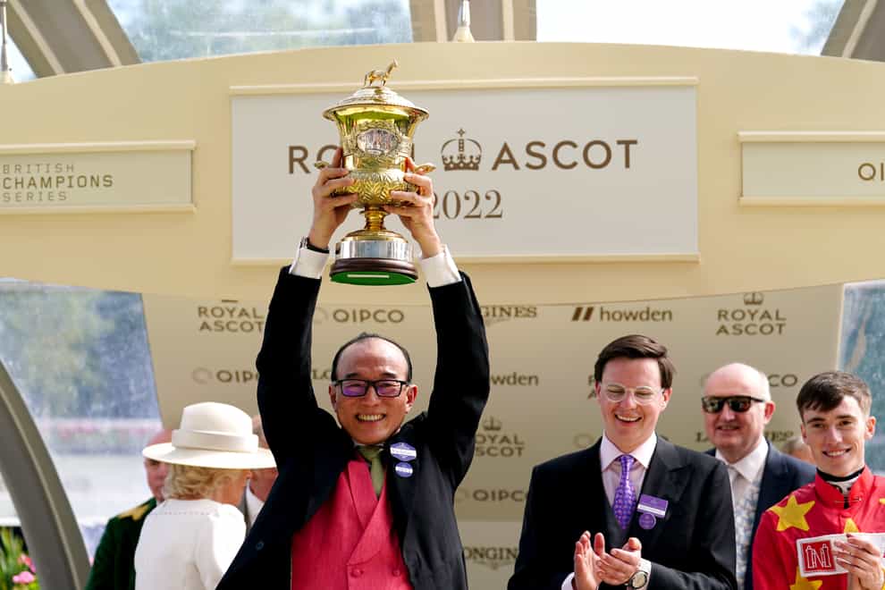 Teo Ah Khing the owner of State of rest celebrates with the trophy alongside trainer Joseph O’Brien and jockey Shane Crosse (far right) after winning The Prince Of Wales’s Stakes during day two of Royal Ascot at Ascot Racecourse. Picture date: Wednesday June 15, 2022.