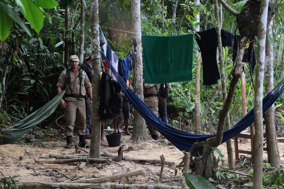 Brazil’s justice minister says police have reported finding human remains in Amazon search, but they have not been identified yet (Edmar Barros/AP)