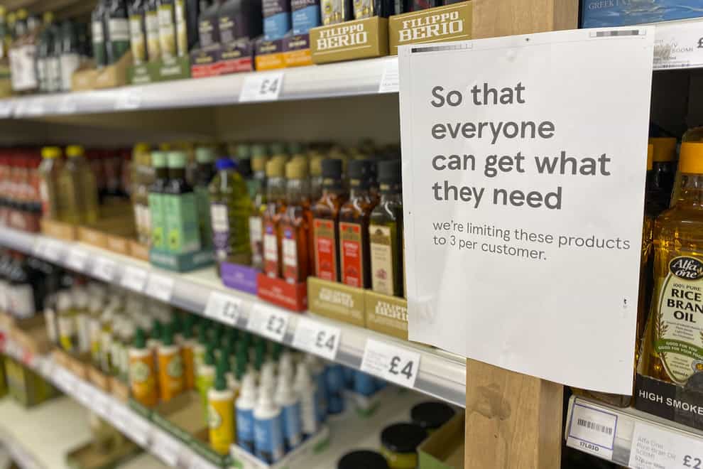 Cooking oil on shelves in a Tesco store in Ashford, Surrey (Steve Parsons/PA)