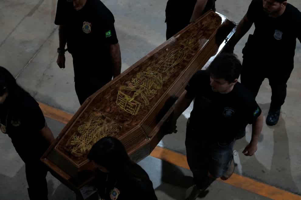 Brazil’s federal police are continuing to search for the missing boat of Dom Phillips and Bruno Pereira as investigators prepare to begin testing human remains found buried in the Amazon (Eraldo Peres/AP)