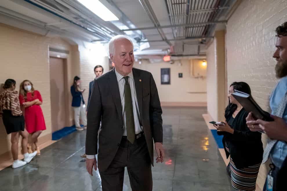 Republican senator John Cornyn of Texas said he was ‘done’ as he left Thursday’s closed-door session of gun law negotiations after nearly two hours, saying he was flying home (J Scott Applewhite/AP)