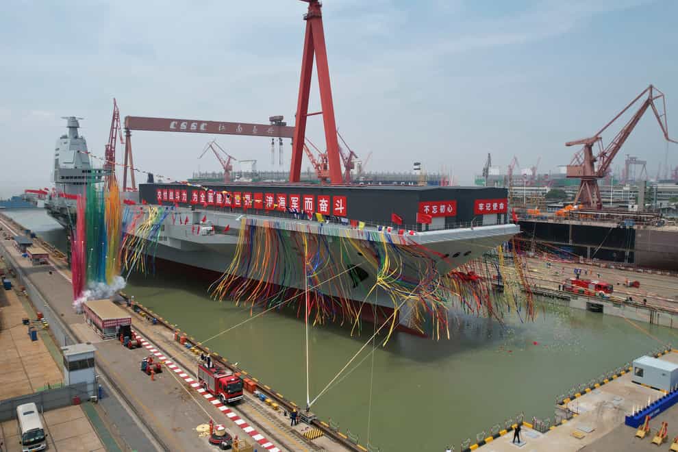 The Fujian is the first aircraft carrier to be designed and built in China (Li Gang/Xinhua via AP)