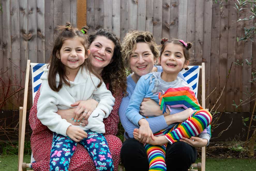 Two mums: Jodie Lancet-Grant (left) with her family (Ellie Kurttz/PA)