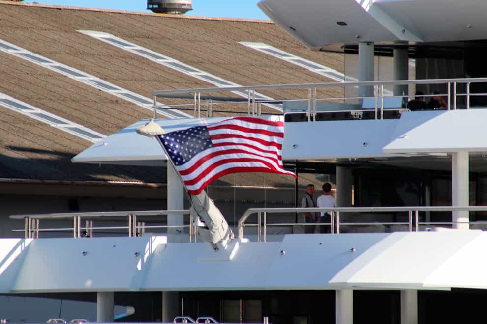 The superyacht Amadea is now moored in Honolulu with an American flag flying at the stern (AP Photo/Audrey McAvoy)