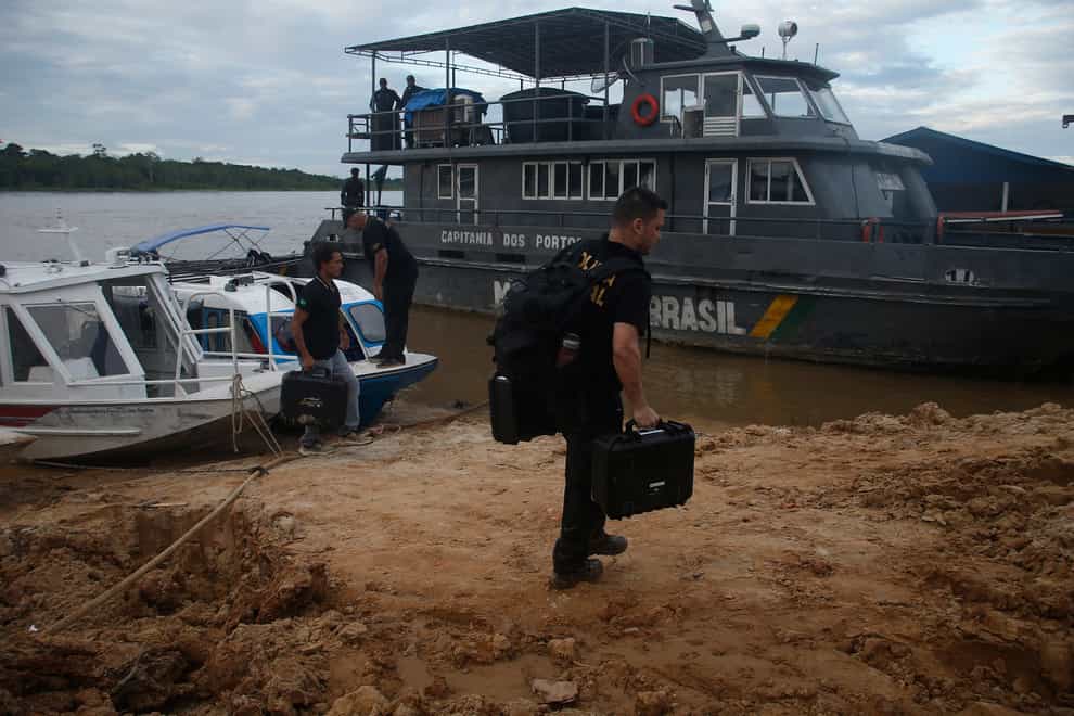 Federal police officers searched for Bruno Pereira and Dom Phillips in Atalaia do Norte in the Amazonas state (Edmar Barros/AP)