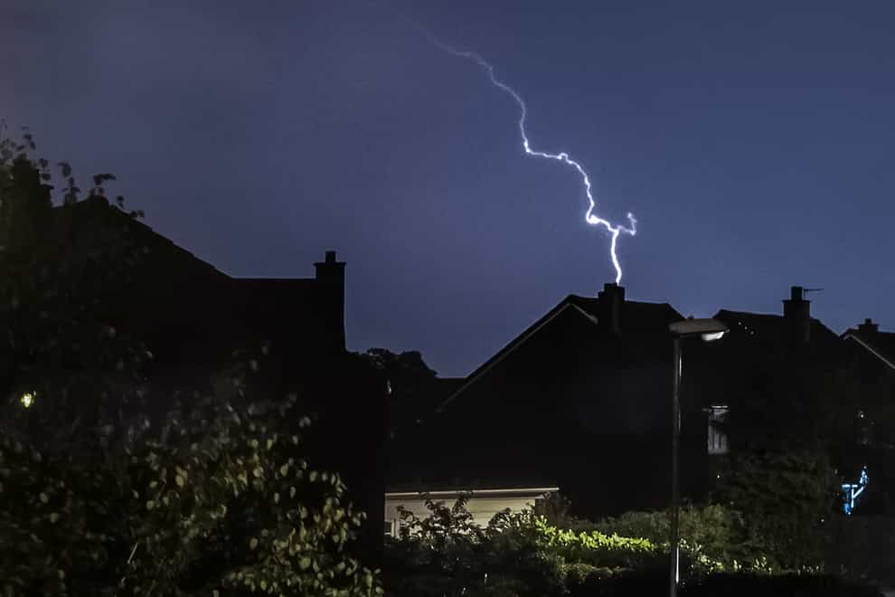 A lightning strikes as the Met Office issued a yellow warning (Danny Lawson/PA Wire)