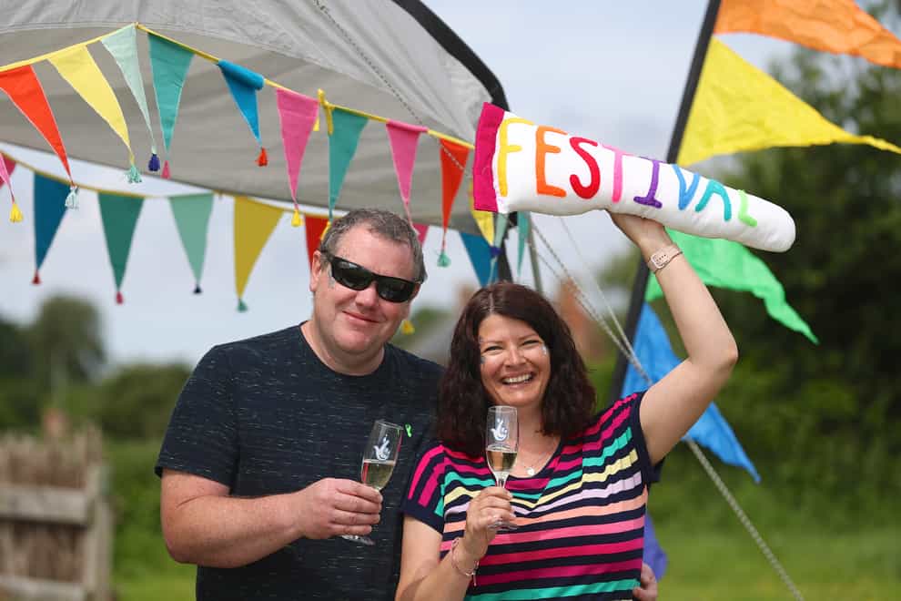 Stephen Webster and Arran Taylor won £1m on Lotto in April 2021 and have been going to Glastonbury for more than 20 years (Martin Bennett/Camelot/PA)