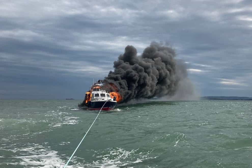 A motor cruiser which caught fire and sank outside Portsmouth Harbour (GAFIRS/PA)