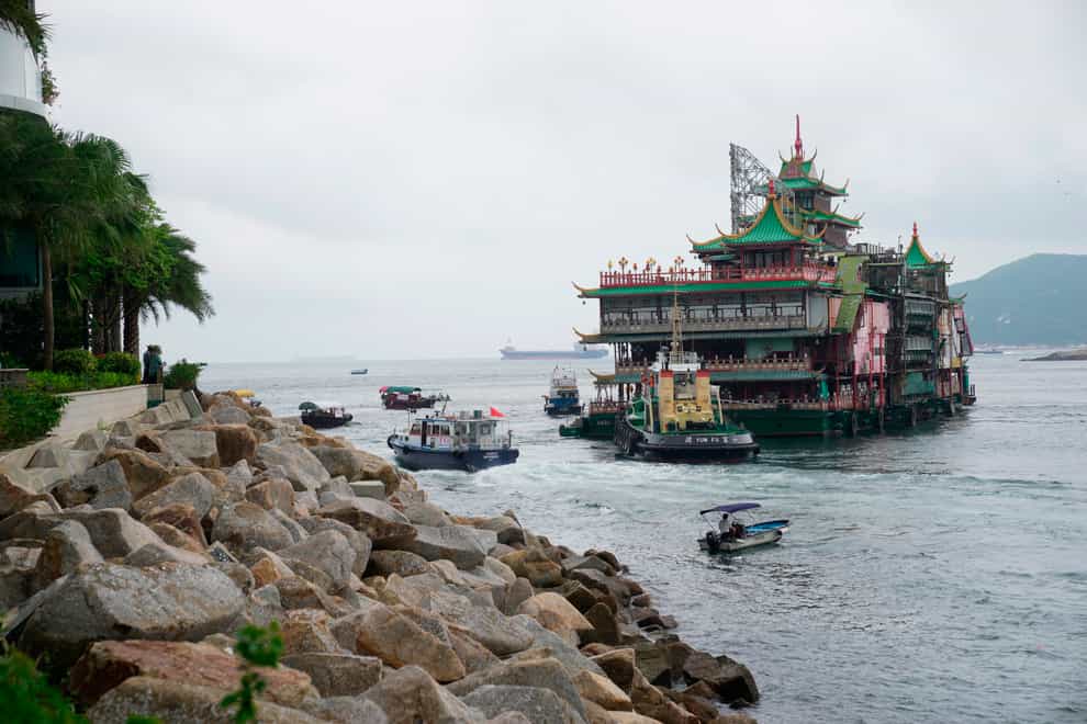 Hong Kong’s Jumbo Floating Restaurant is towed away (Kin Cheung)