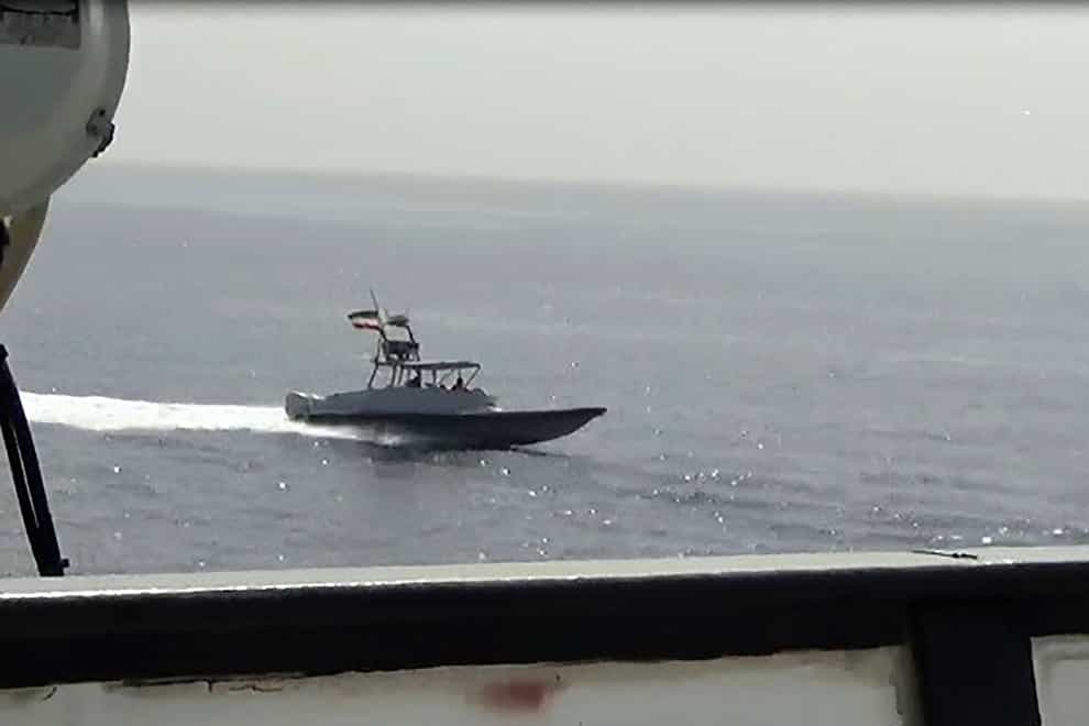 A boat of Iran’s Islamic Revolutionary Guard Corps Navy operates in close proximity to patrol coastal ship USS Sirocco (US Navy via AP)