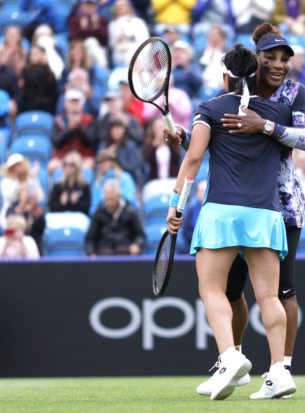 Serena Williams (right) celebrates with team-mate Ons Jabeur after registering a first round win in the Rothesay International Eastbourne (Steven Paston/PA)