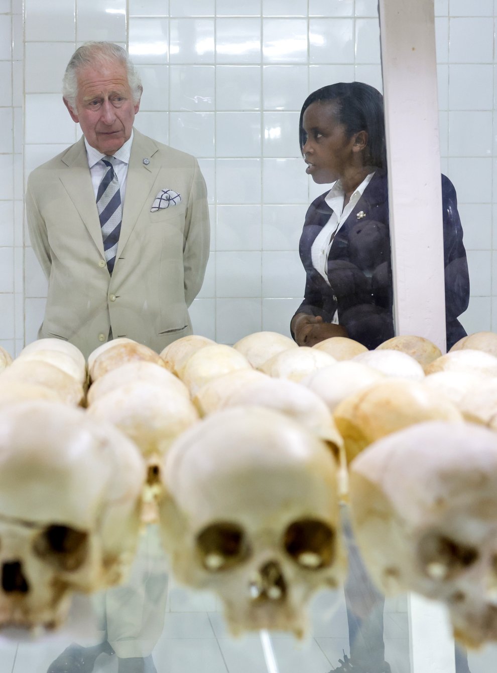 Manager Rachel Murekatete shows the Prince of Wales skulls of victims during his visit to the Nyamata Church Genocide Memorial, as part of his visit to Rwanda (Chris Jackson/PA)