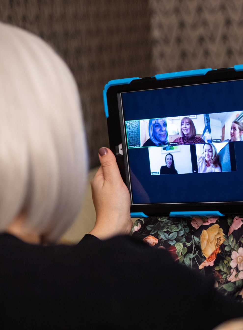A group of women use the Zoom video conferencing application to have a group chat from their separate homes (PA)