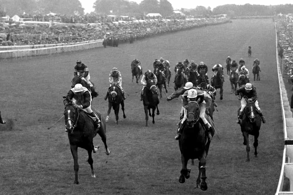 Lavandin, ridden by Rae Johnstone, passes the post to win the 1956 Derby (PA)