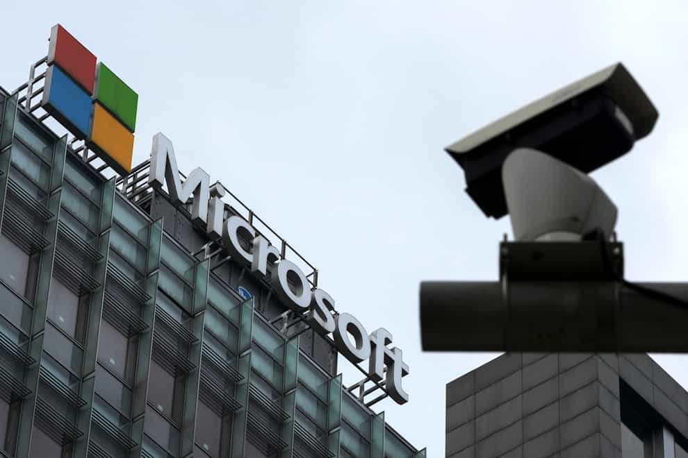 A security surveillance camera is seen near the Microsoft office building in Beijing (Andy Wong/AP)