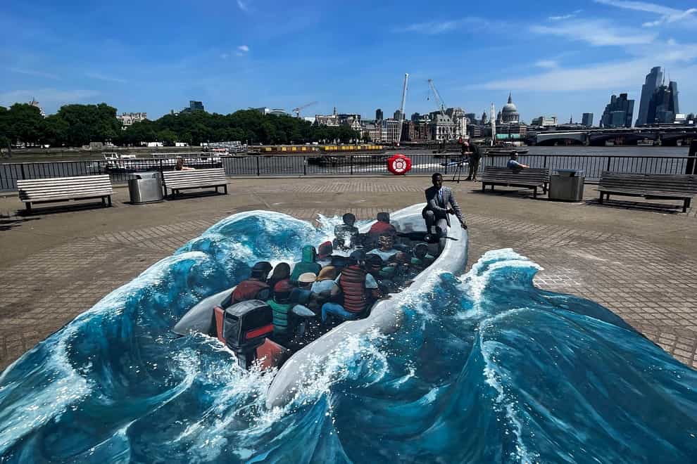 Three immersive artworks have been unveiled on London’s Southbank, depicting Ethiopian refugee Eskander Turki’s journey to safety in the UK (Migrant Help/PA)
