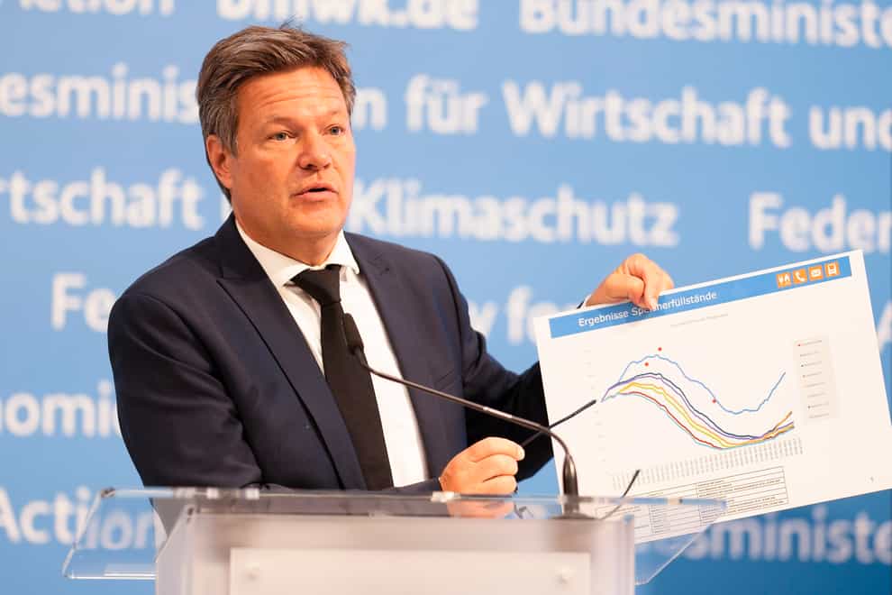 Robert Habeck shows a diagram about German gas storage during a news conference in Berlin (Markus Schreiber/AP)