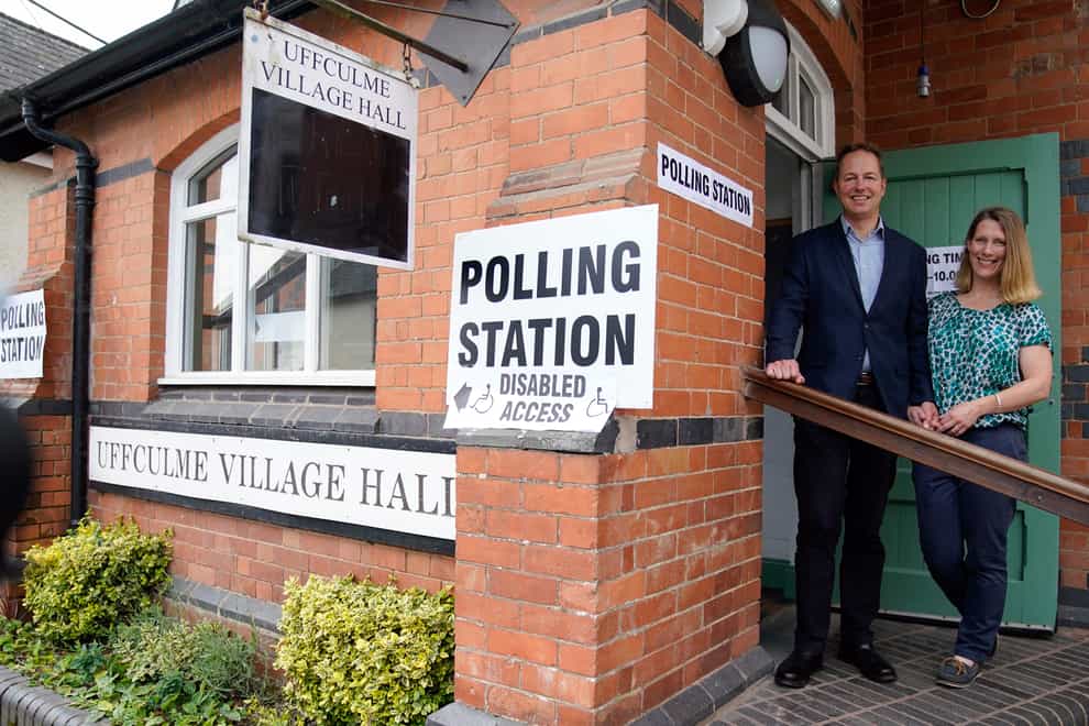The Liberal Democrats’ by-election candidate Richard Foord (left) poses for a photograph with his wife Kate after they cast their votes at the Uffculme Village Hall in Uffculme, in the Tiverton and Honiton by-election, which was triggered by the resignation of MP Neil Parish for watching pornography in the Commons. Picture date: Thursday June 23, 2022 (Andrew Matthews/PA)