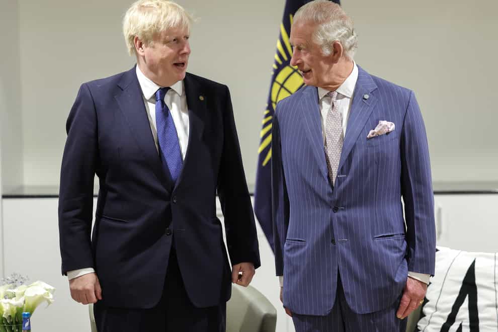 Prime Minister Boris Johnson and the Prince of Wales meet over morning tea prior to a family photo with Commonwealth heads (Chris Jackson/PA)