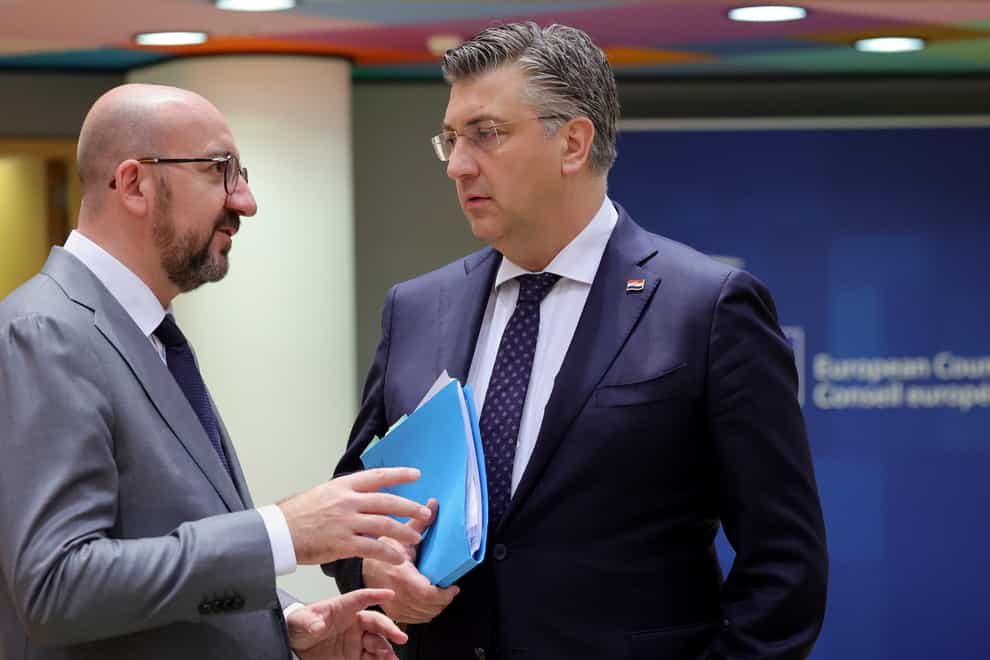 European Council President Charles Michel, left, speaks to Croatia’s Prime Minister Andrej Plenkovic (Olivier Matthys/AP)