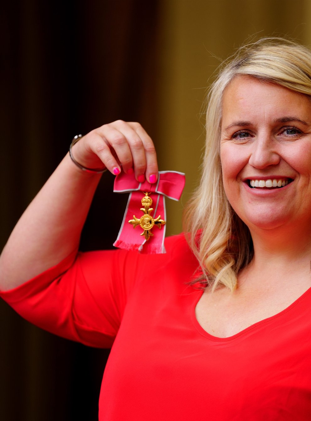 Chelsea Women’s manager Emma Hayes with her OBE (Victoria Jones/PA)