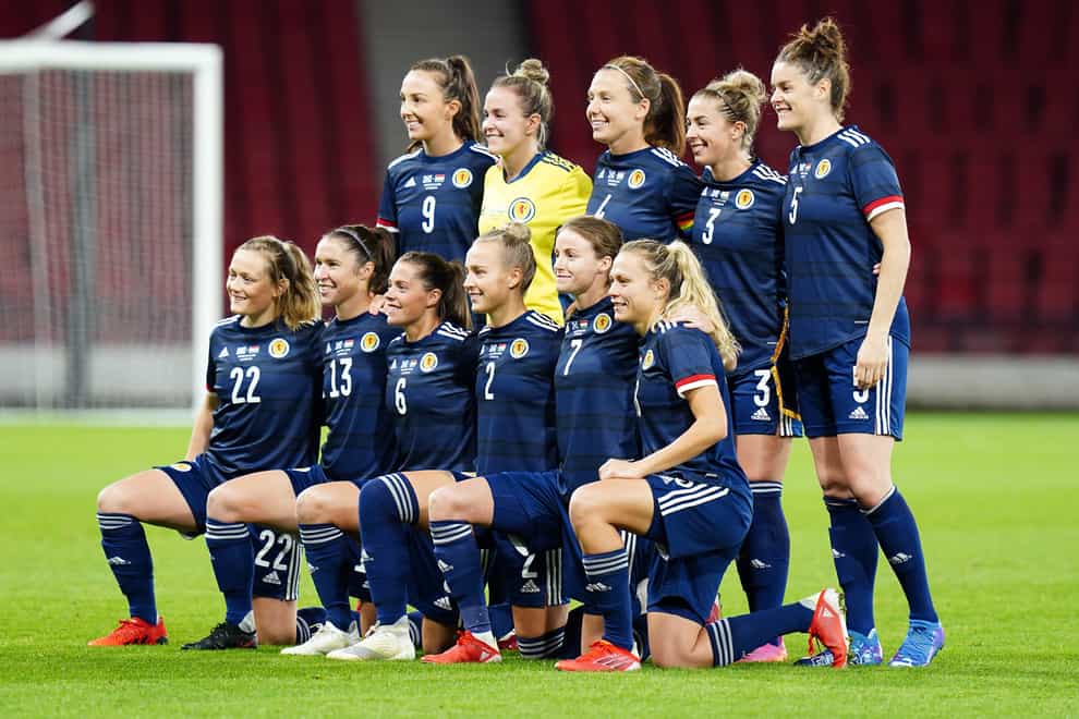A schoolgirl was surprised by her favourite Scottish player, Arsenal Women defender Jen Beattie, far right, after visiting the Scotland National team’s training ground (Jane Barlow/ PA)