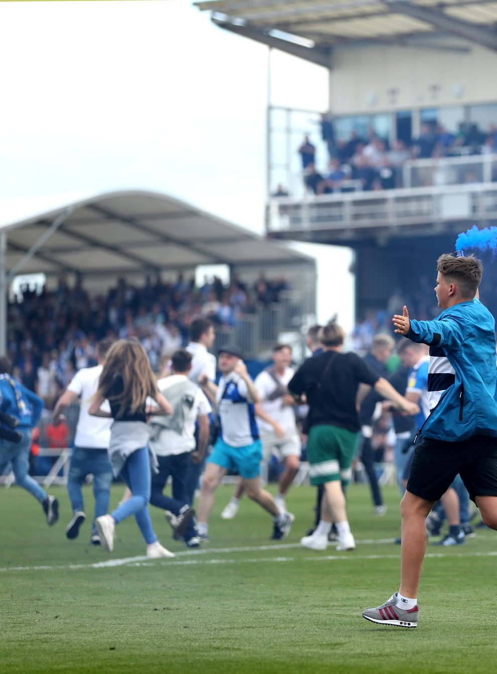 Fans invaded the pitch at the Memorial Stadium causing a lengthy delay (Bradley Collyer/PA)
