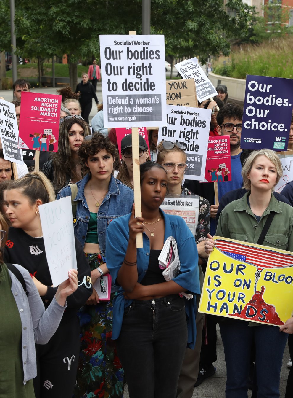Demonstrators gather outside the United States embassy in Vauxhall, south London to protest against the decision to scrap constitutional right to abortion (Ashlee Ruggels/PA)